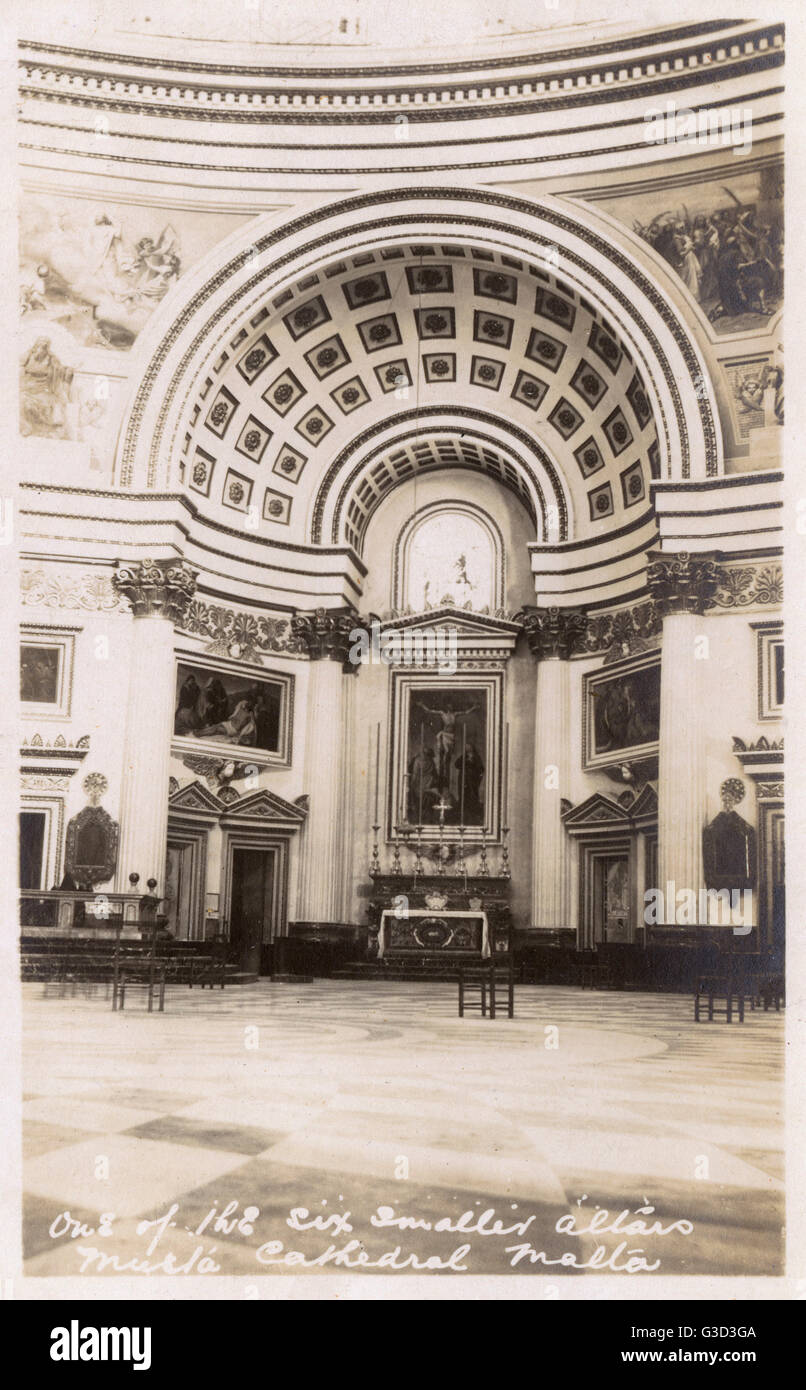 One of the six smaller altars altar at The Church of the Assumption of Our Lady, commonly known as the Rotunda of Mosta or Rotunda of St Marija Assunta (sometimes shortened to as The Mosta Dome) - a Roman Catholic church in Mosta, Malta. The fourth larges Stock Photo