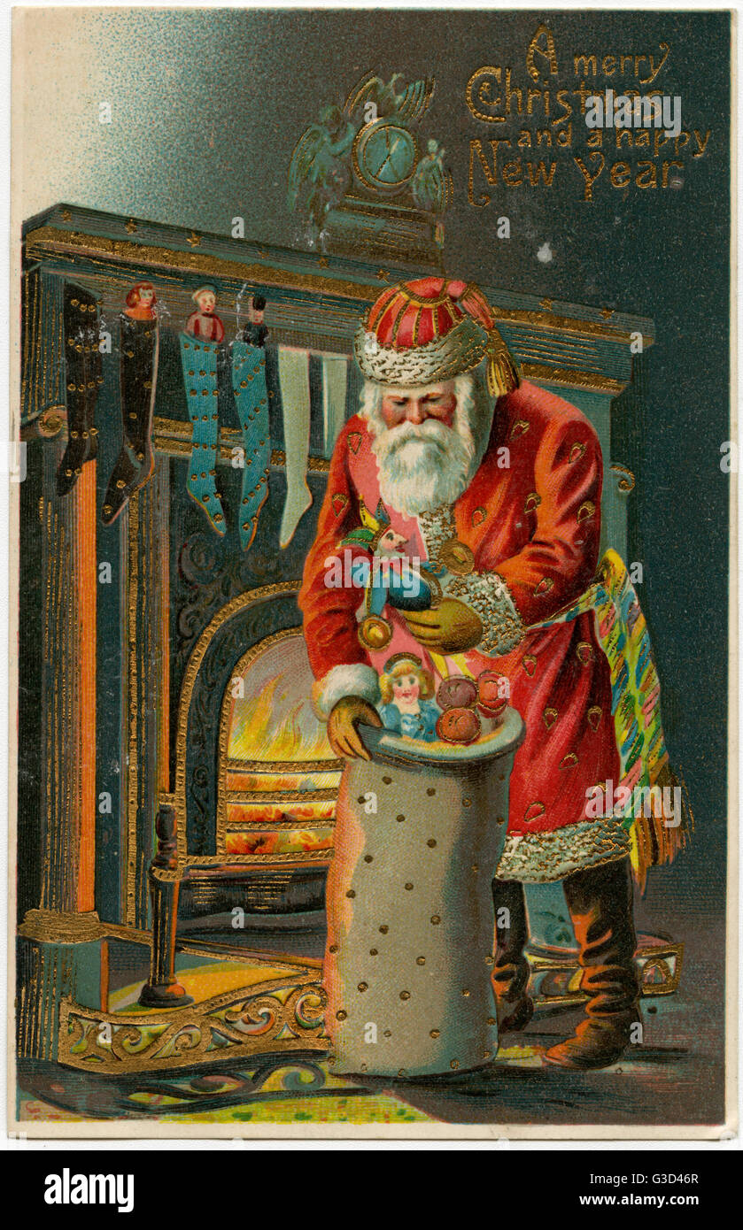 A terrific Edwardian postcard depicting Father Christmas - selecting gifts from his sack to add to the children's stockings hanging on the Fireplace. Santa did well not to receive a singed bottom when descending the chimney...     Date: circa 1906 Stock Photo