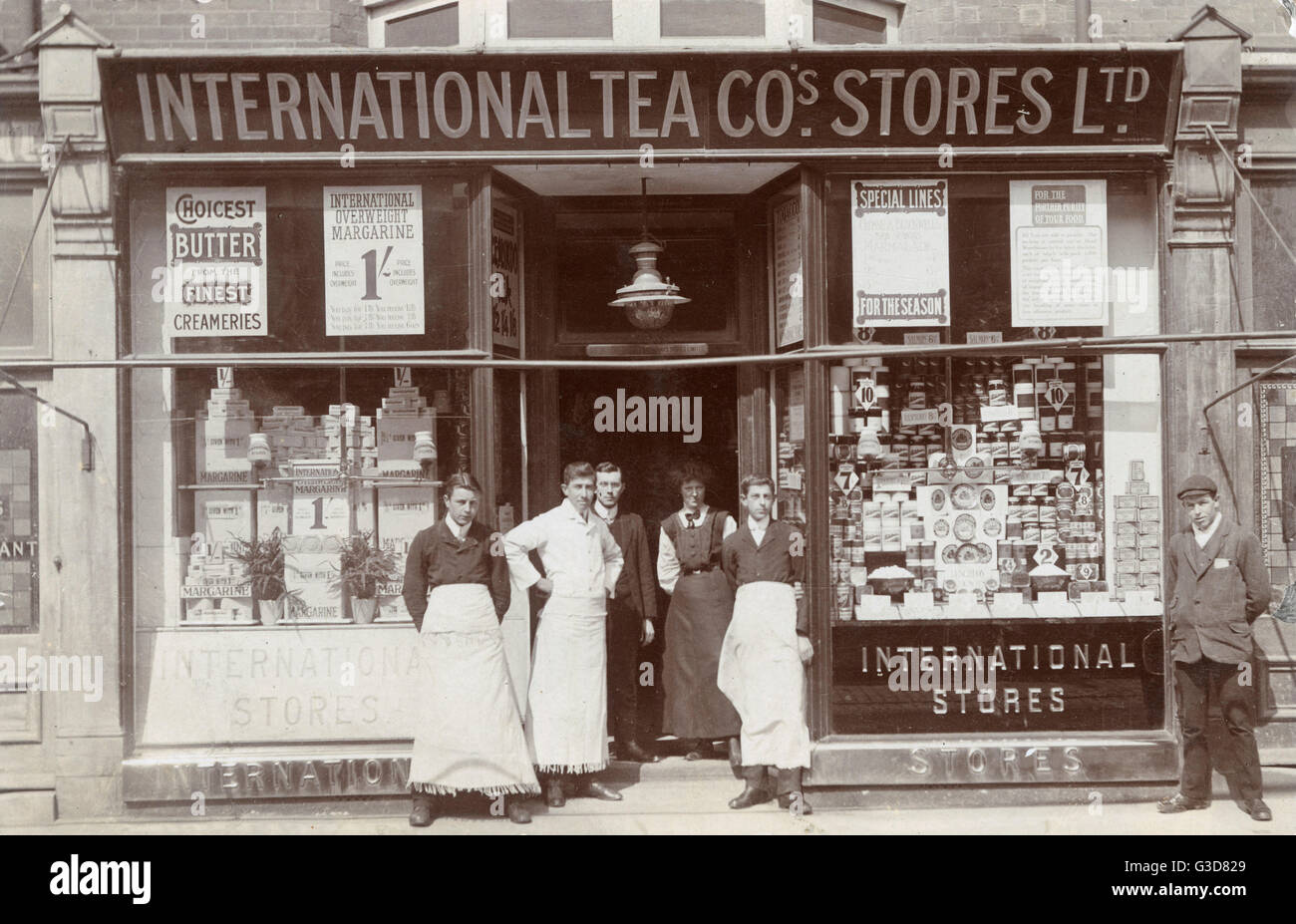 Staff in the doorway of the International Tea Company Stores grocery