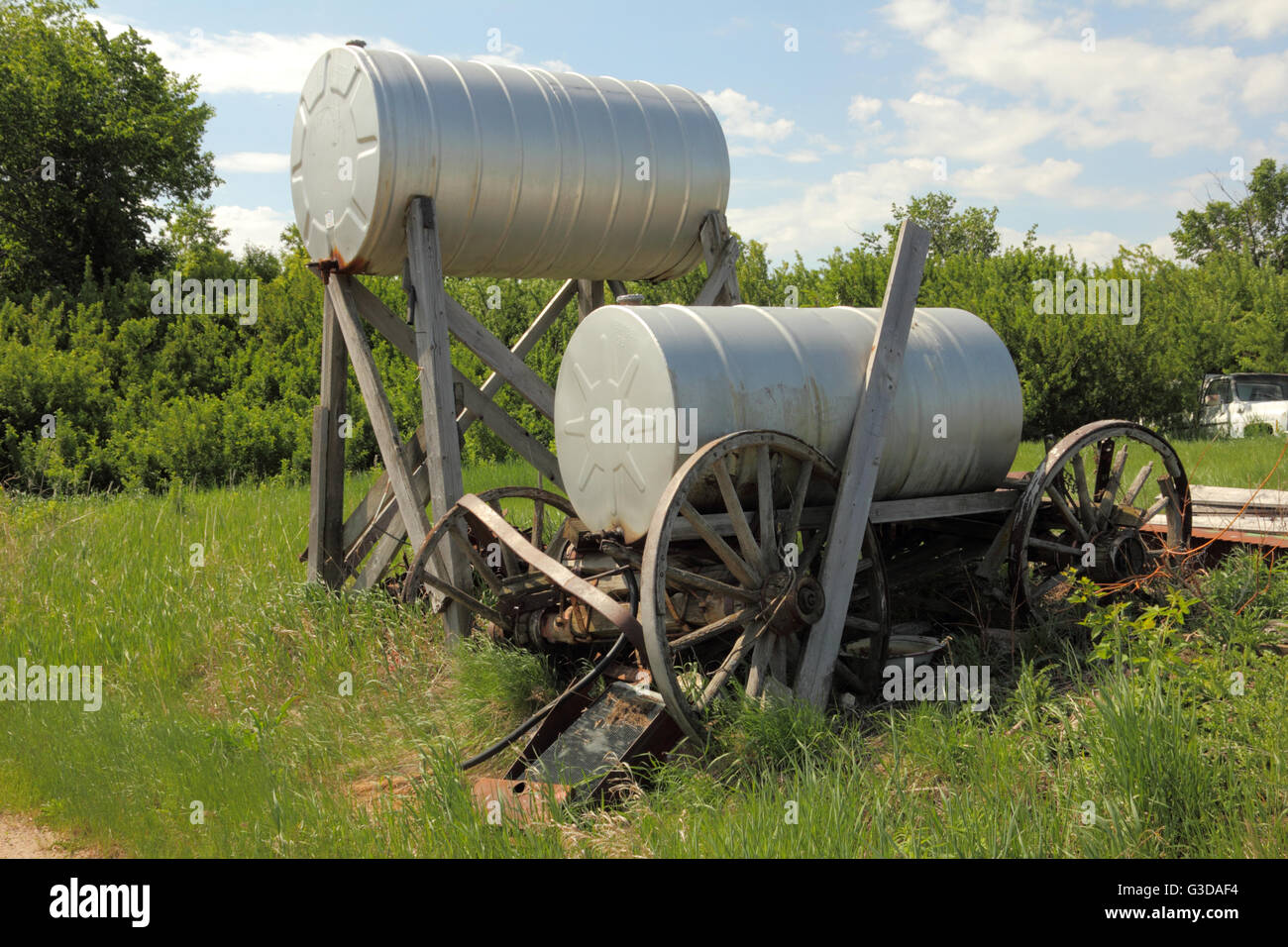 Metal elevated fuel tank on a farm in Alberta, Canada. Stock Photo