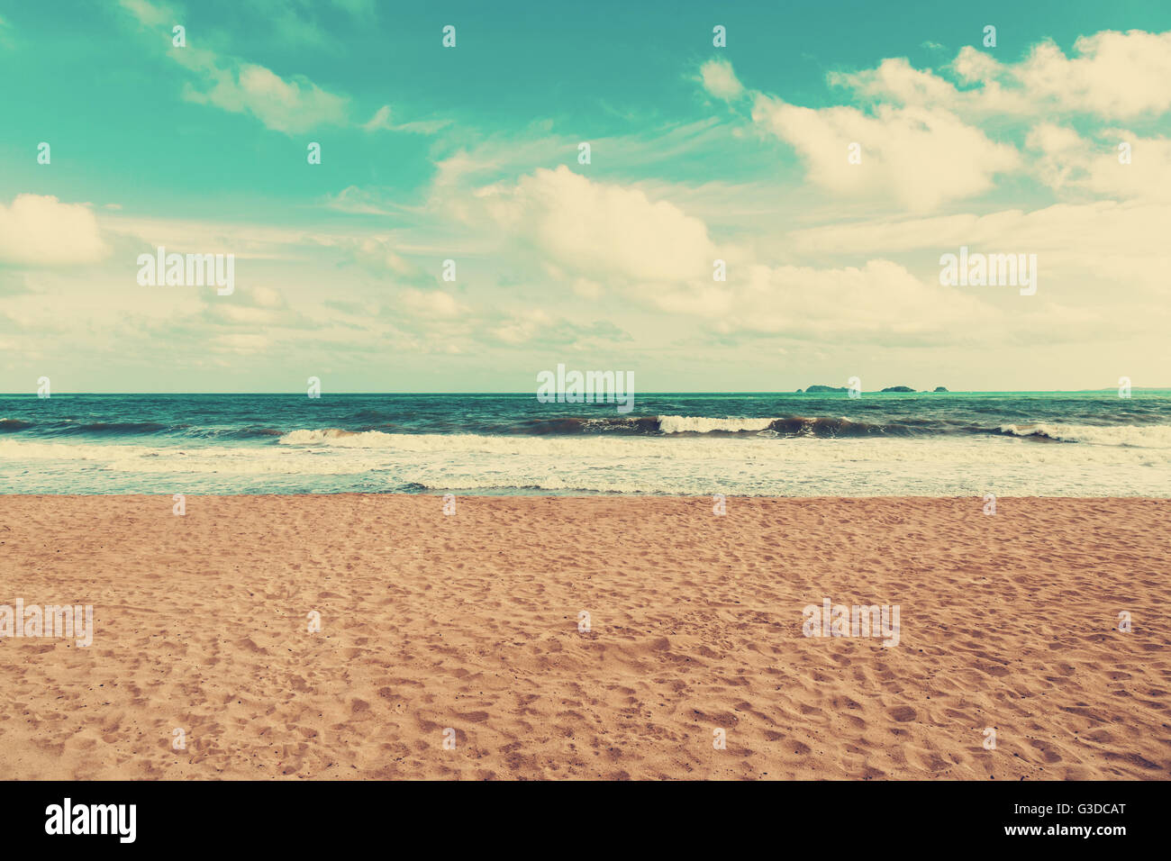 Retro beach and blue sky with vintage tone Stock Photo - Alamy