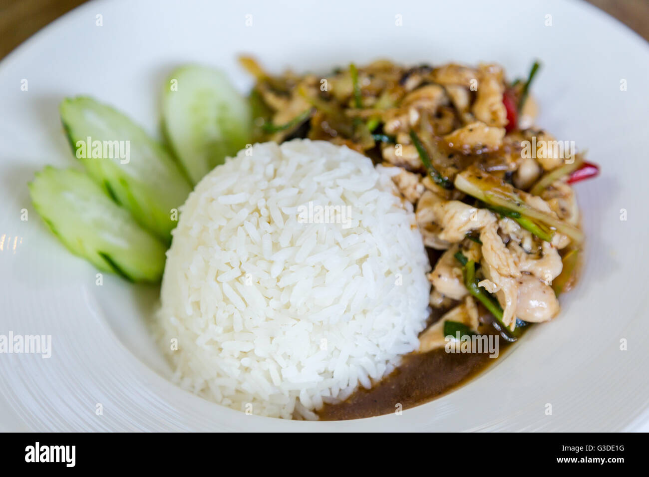 Thai food Thai spicy food, Fried chicken with sweet basil. Stock Photo