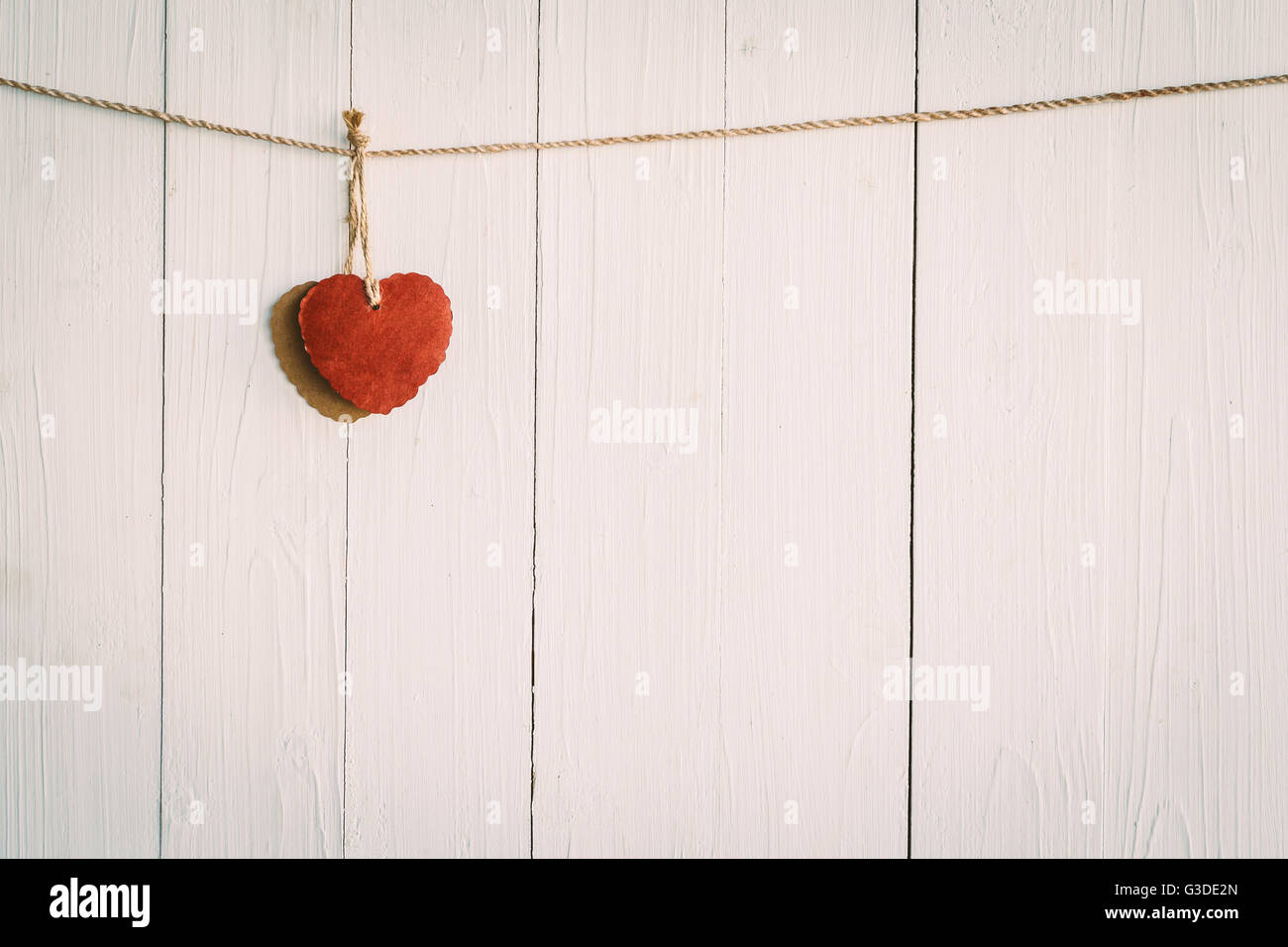 Heart on white wooden background with Vintage style Stock Photo - Alamy
