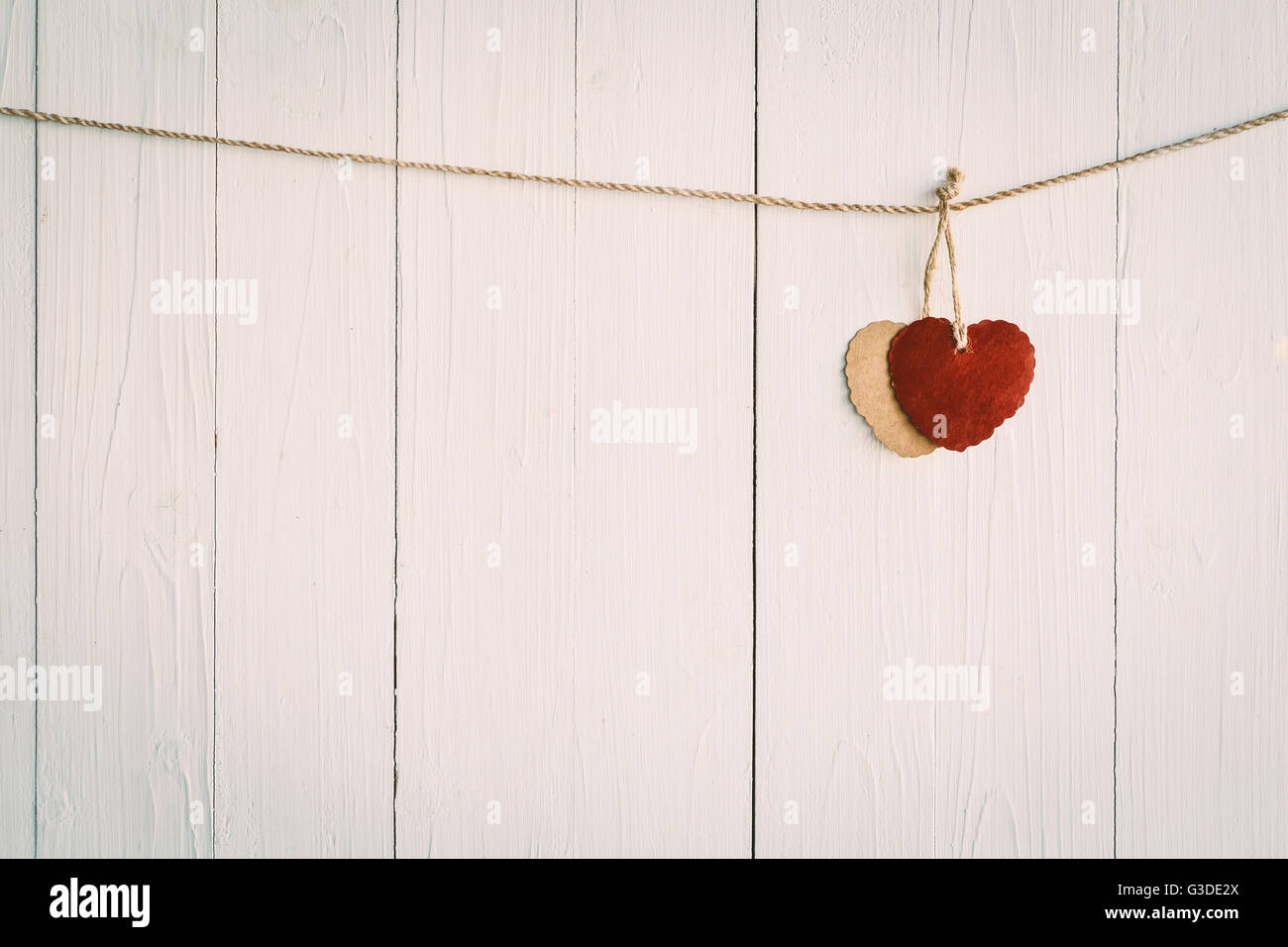 Heart on white wooden background with Vintage style Stock Photo - Alamy