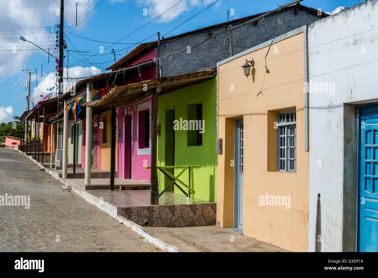 Row of colourful houses in the village of Serra Negra near Bezerros, Pernambuco, Brazil Stock Photo