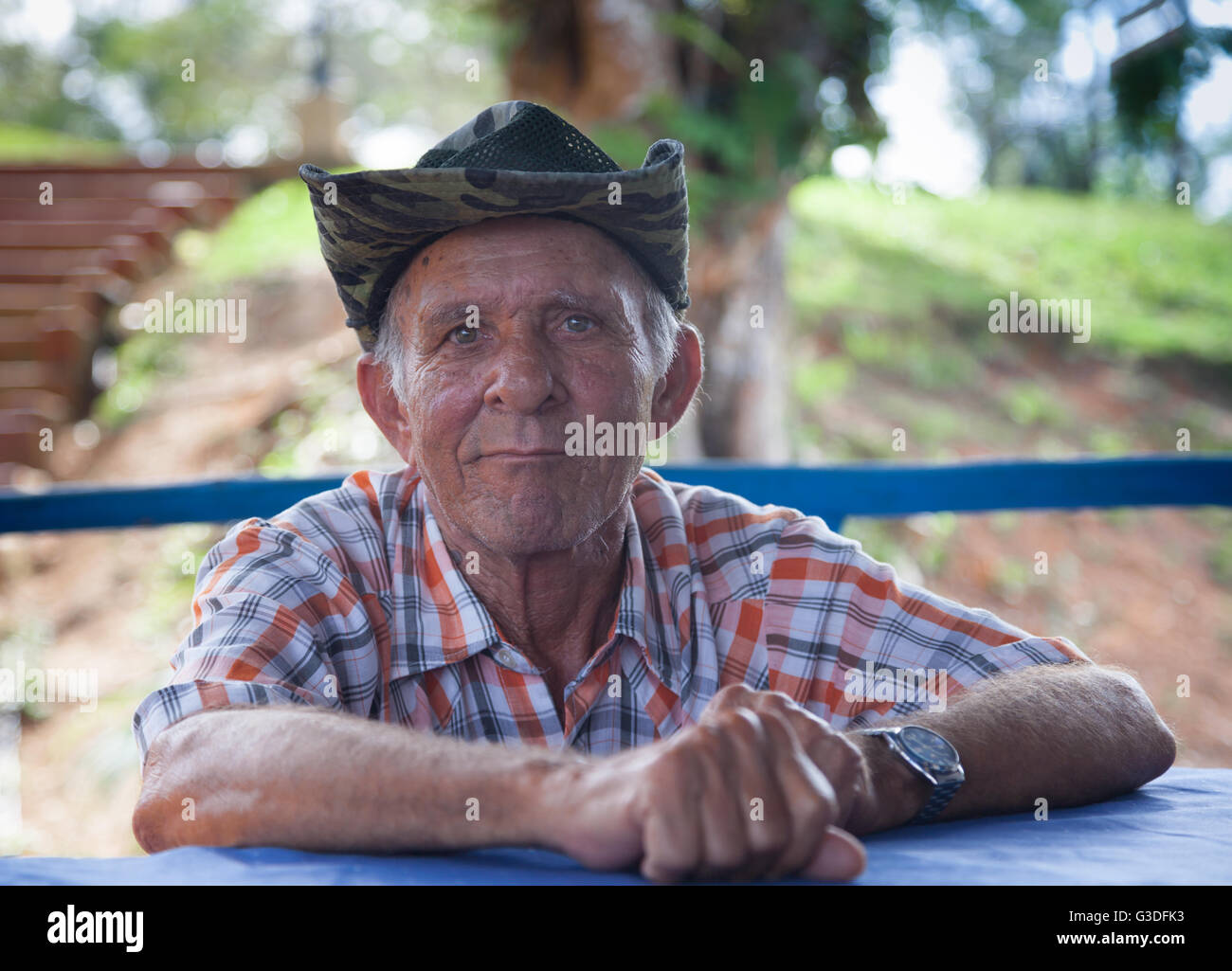 Cuban farmer friendly looks into the camera Stock Photo