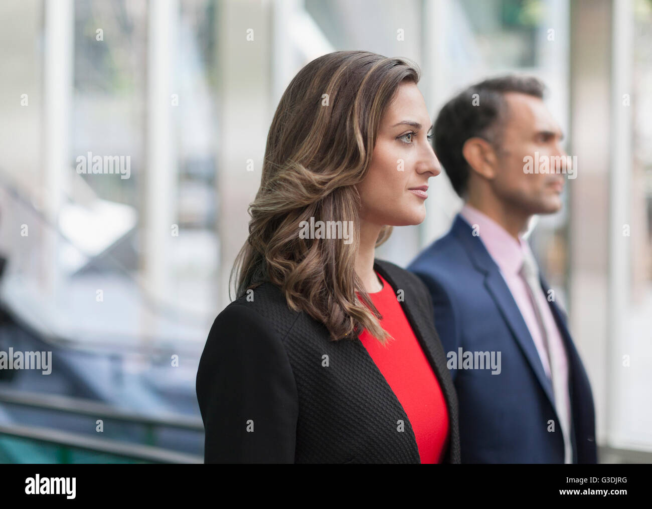 Pensive corporate businesswoman looking away Stock Photo