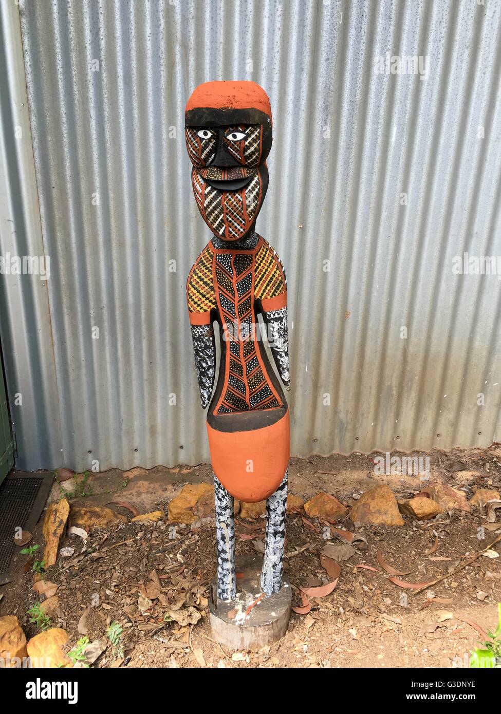 A painted wooden sculpture outside on Bathurst Island, one of the Tiwi Islands. Stock Photo