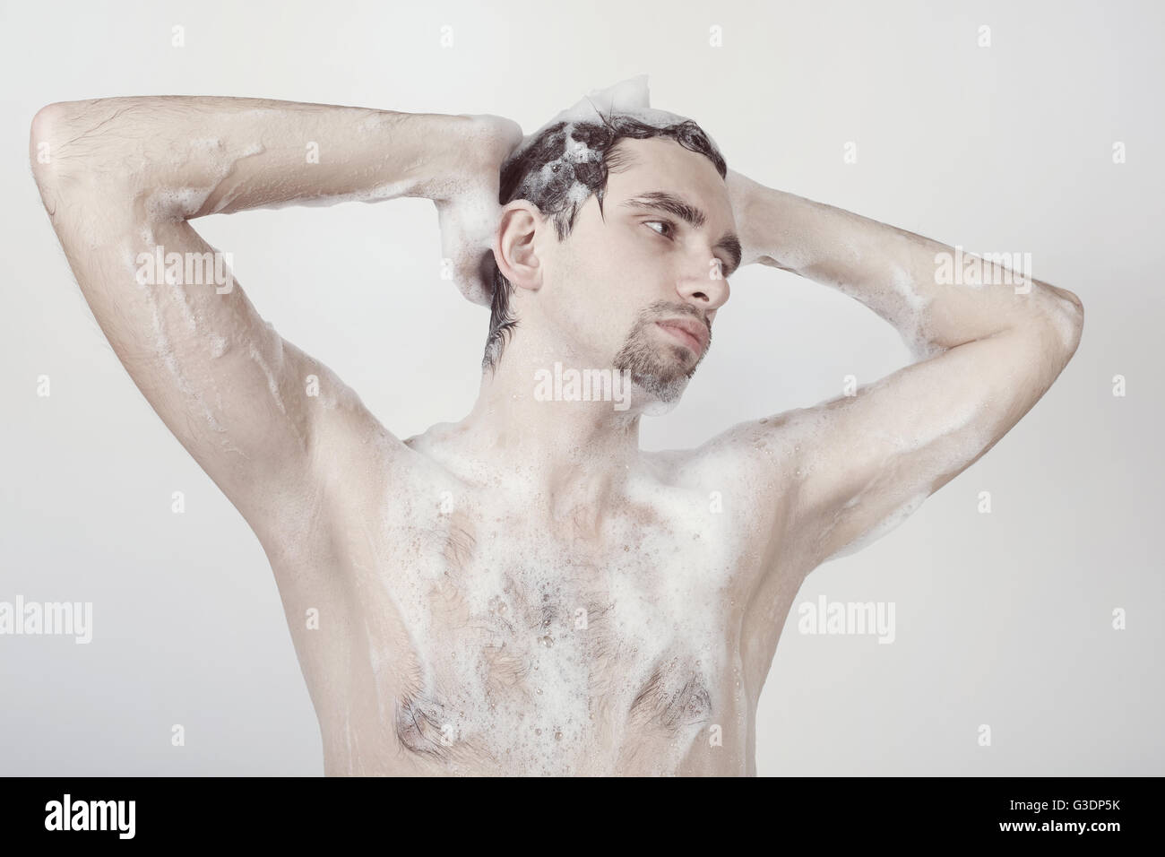 naked young shower Young naked man taking shower in the foam Stock Photo - Alamy