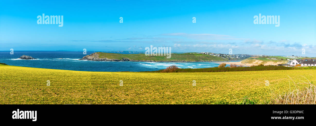 Crantock Beach and Pentire Point East, Newquay, Cornwall, UK. The small island to the left is called The Goose. Stock Photo