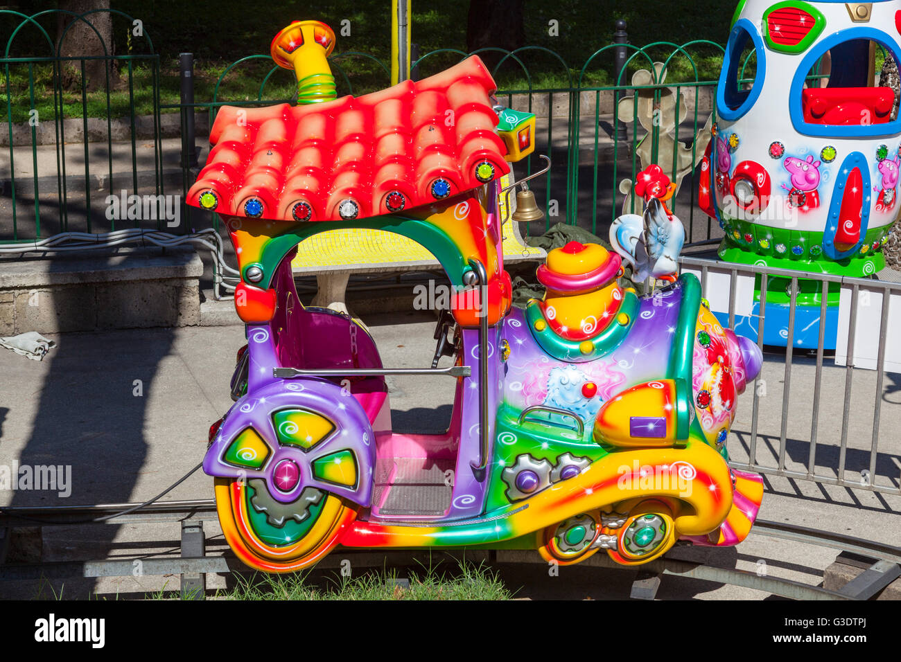 Colourful children’s ride, Naples, Italy Stock Photo