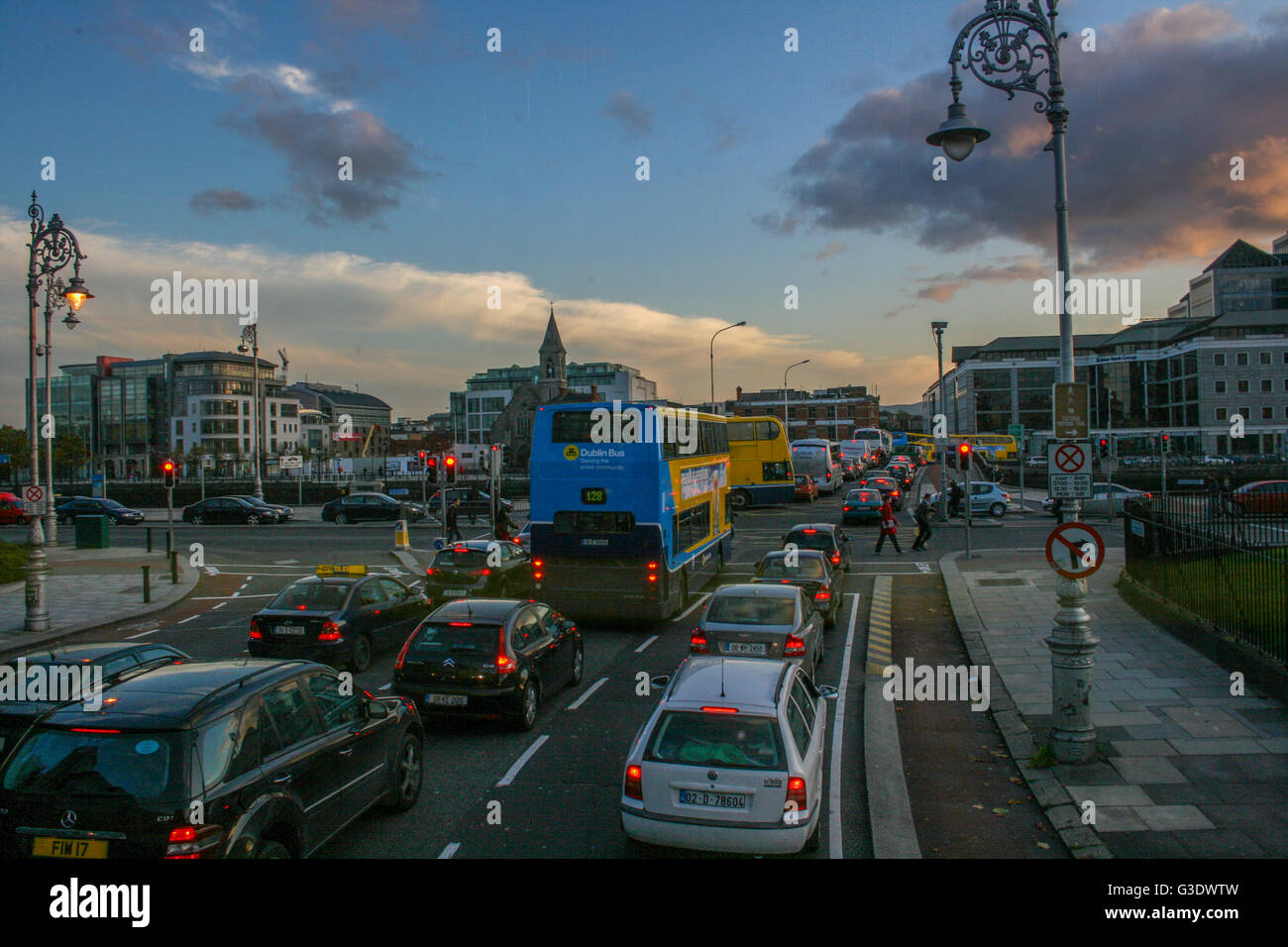 Dublin Ireland, traffic jam during rush hour. Commuters rushing home as the sun sets creating a backlog of traffic. Stock Photo