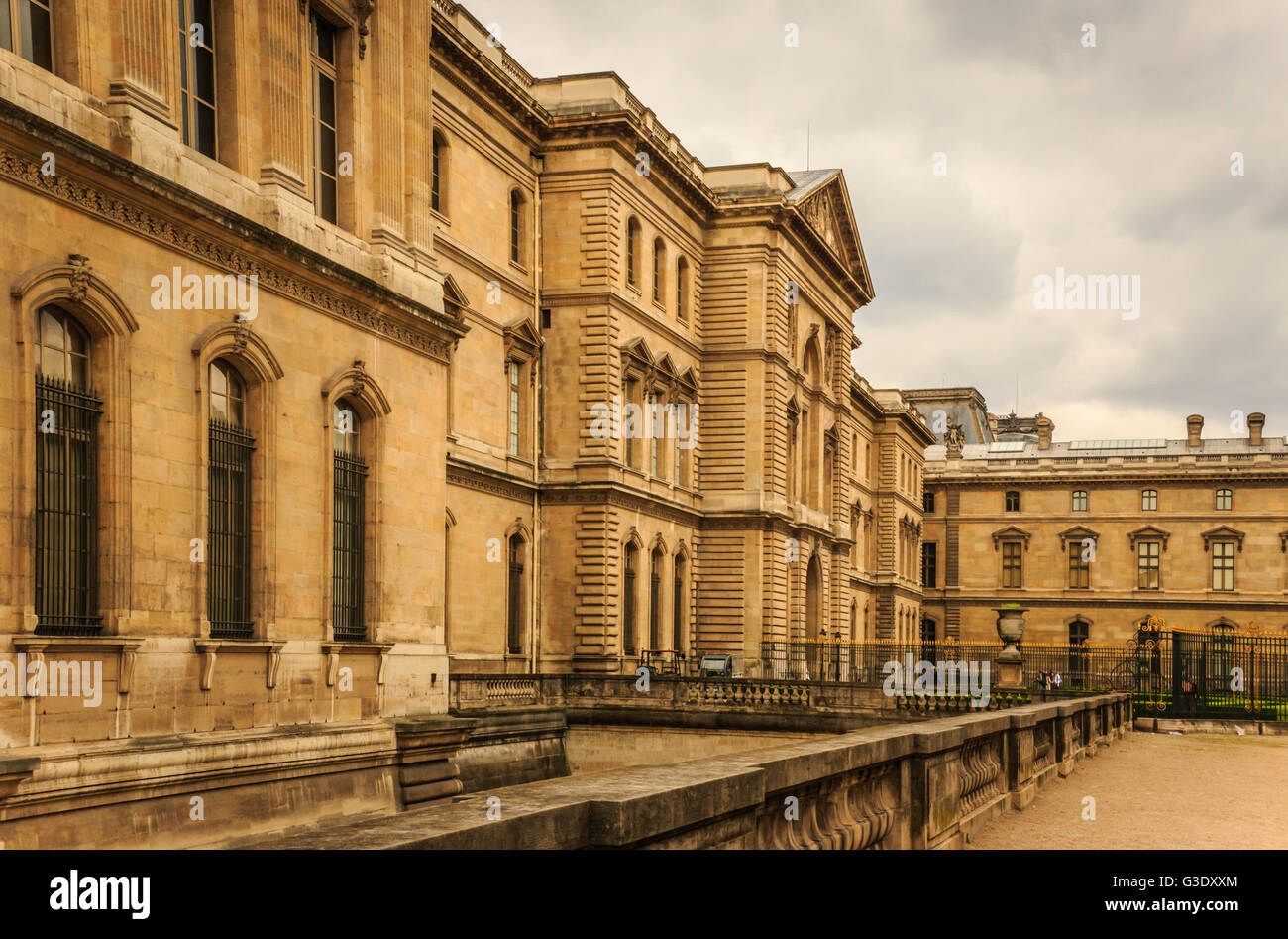 Originally built in 1190 as a fortress, The Louvre later became a palace for King Francis I and is now a famous museum. Stock Photo