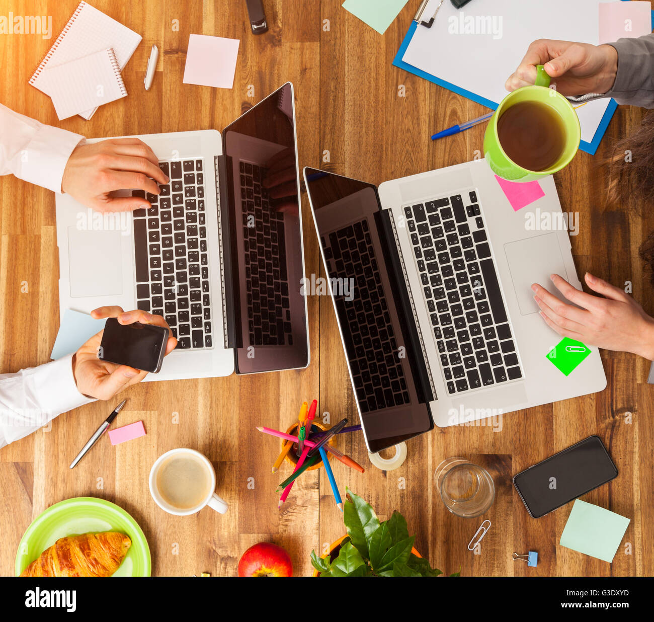 Working laptops table modern office hi-res stock photography and images ...
