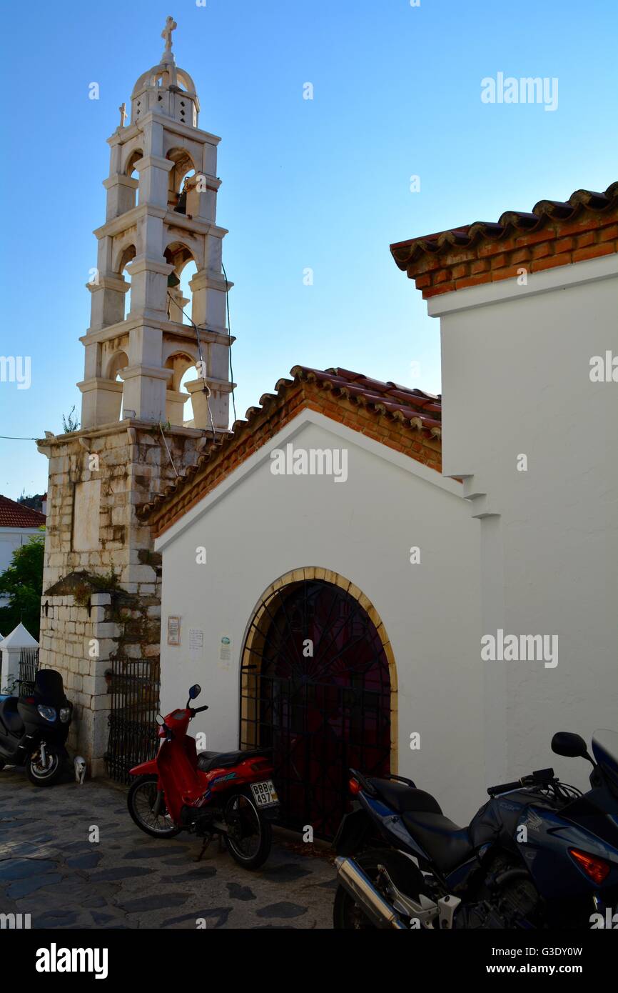 motorbikes outside a church on the greek island of skopelos Stock Photo