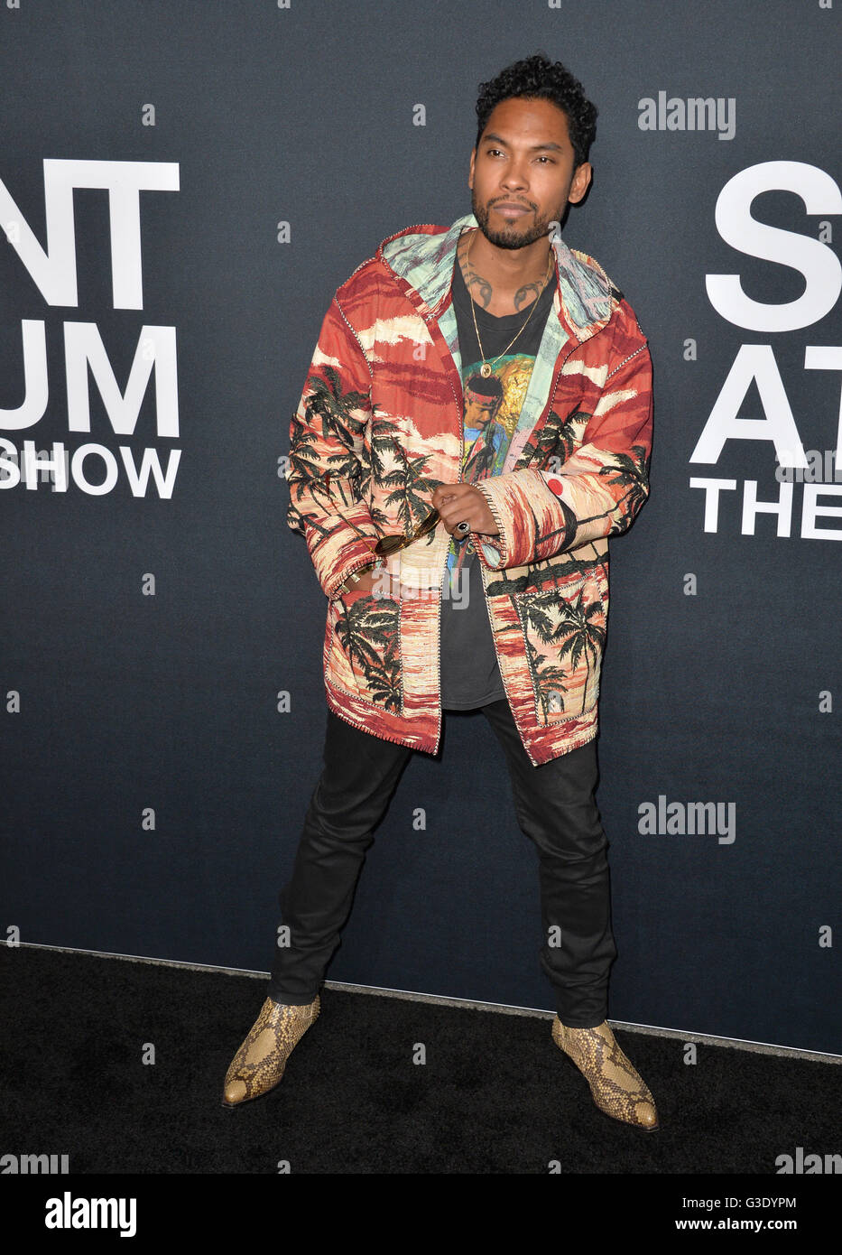 LOS ANGELES, CA - FEBRUARY 10, 2016: Singer Miguel arriving at the Saint Laurent at the Palladium fashion show at the Hollywood Palladium. Stock Photo