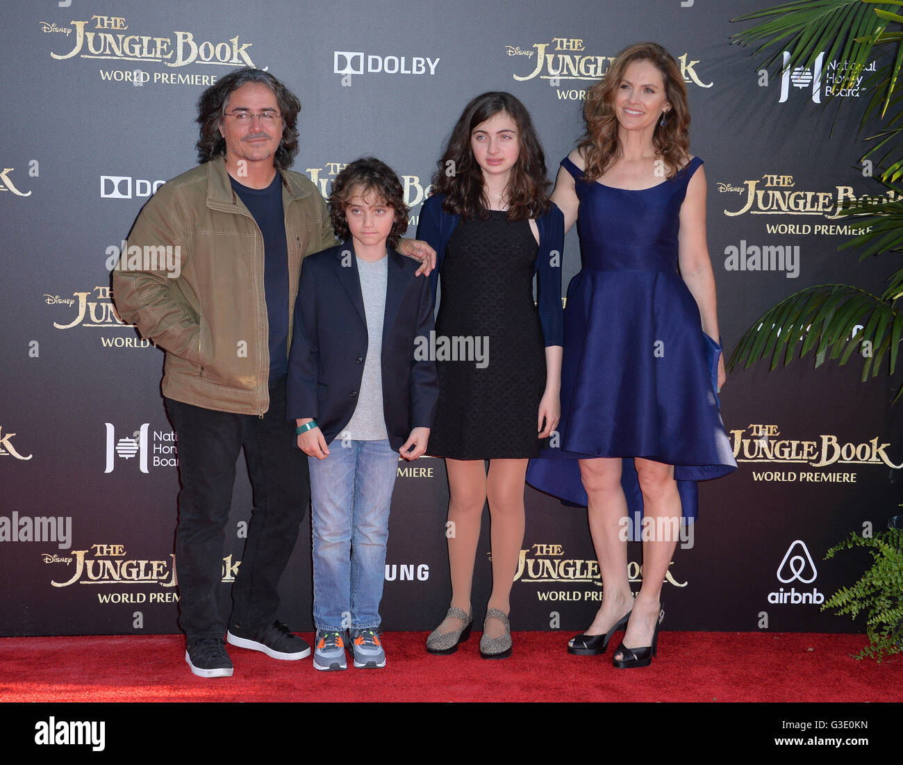 LOS ANGELES, CA. April 4, 2016. Actress Amy Brenneman & husband Brad Silberling & children at the world premiere of 'The Jungle Book' at the El Capitan Theatre, Hollywood. Stock Photo