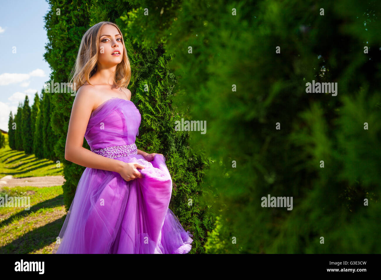 Blonde woman green dress hi-res stock photography and images - Alamy
