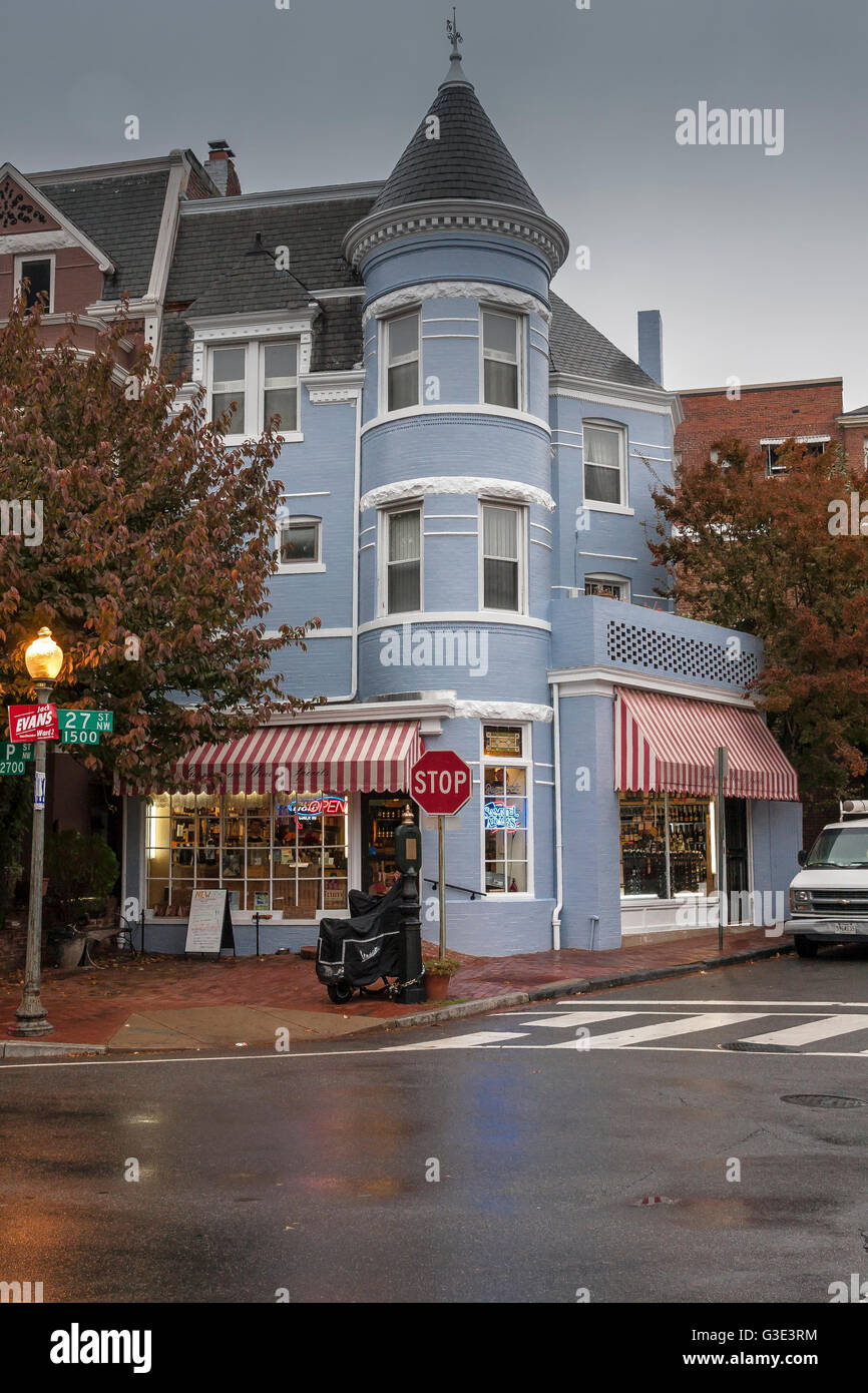 Wine & Spirits on the street level of a magnificent blue