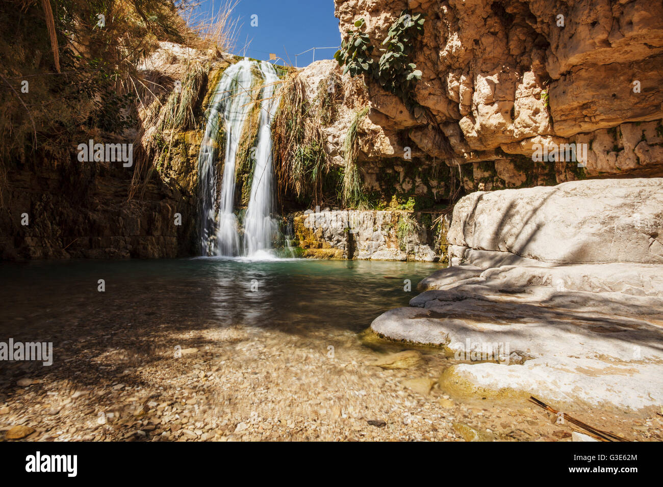 David And His Men Stayed In Ein Gedi And Certainly Enjoyed The Fresh Water Falling From The Desert Plateau Above. There Are Several Waterfalls Of D... Stock Photo