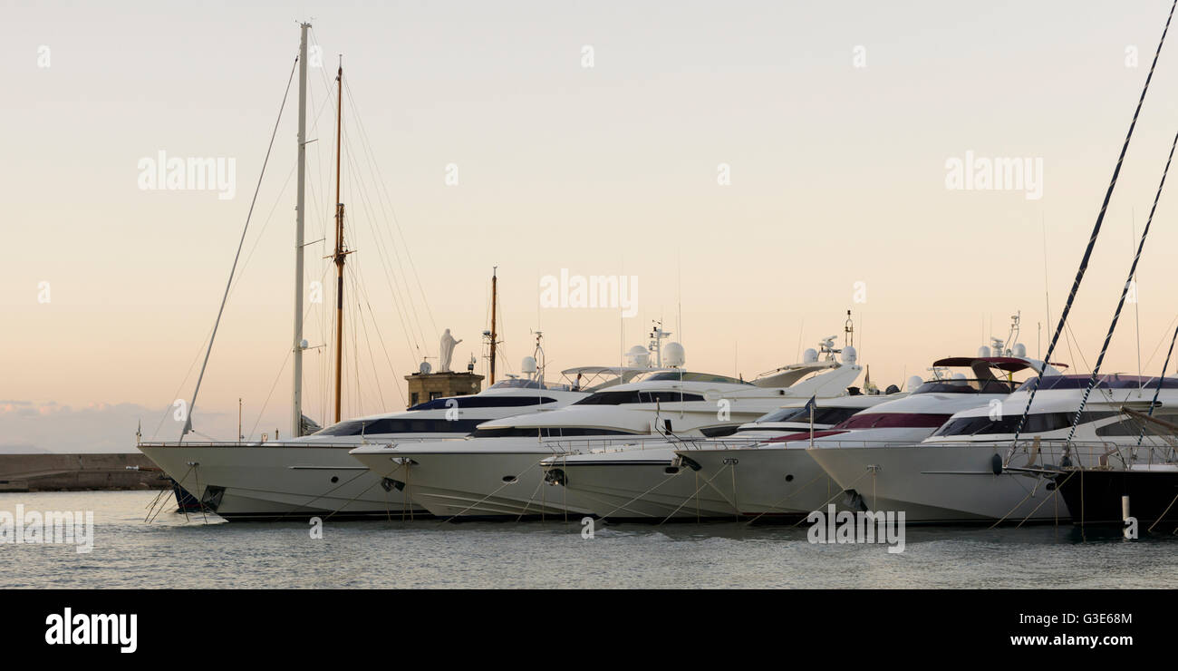 A row of yachts moored in a harbour; Ischia, Italy Stock Photo