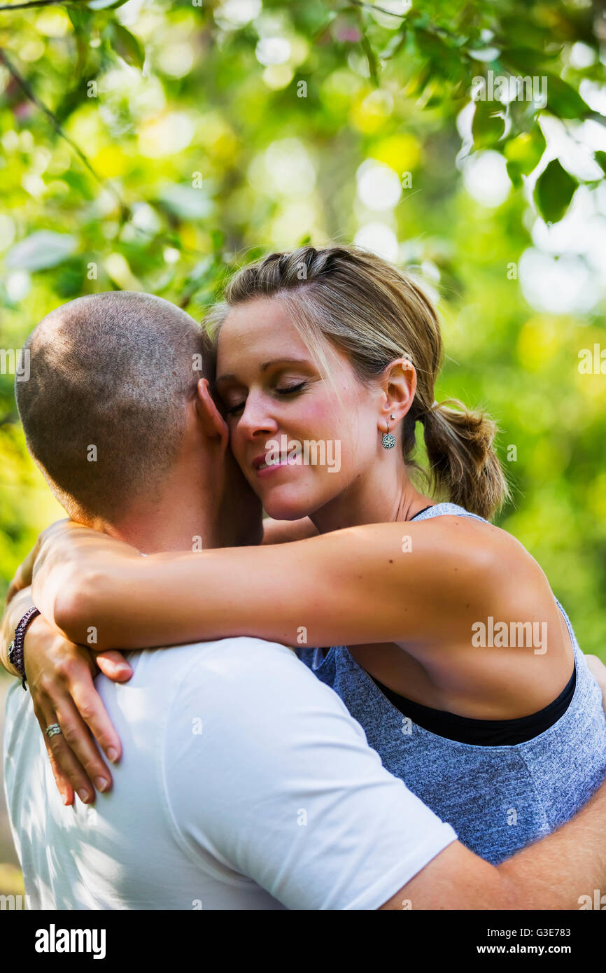 A married couple spending quality time together in a park; Edmonton ...