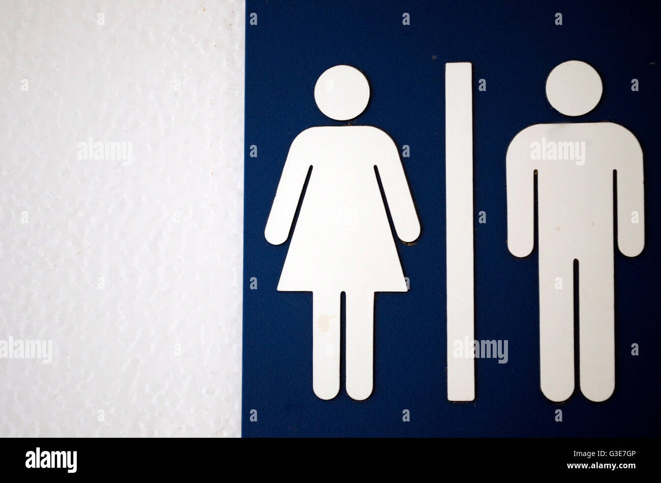 Female and Male Symbol on a Restroom Sign Stock Photo