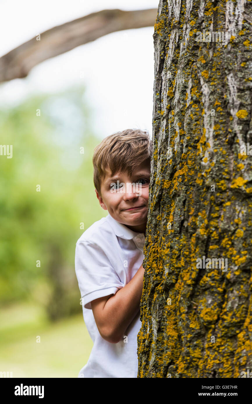 Teenage Boys in Friendly Embrace in a Park · Free Stock Photo