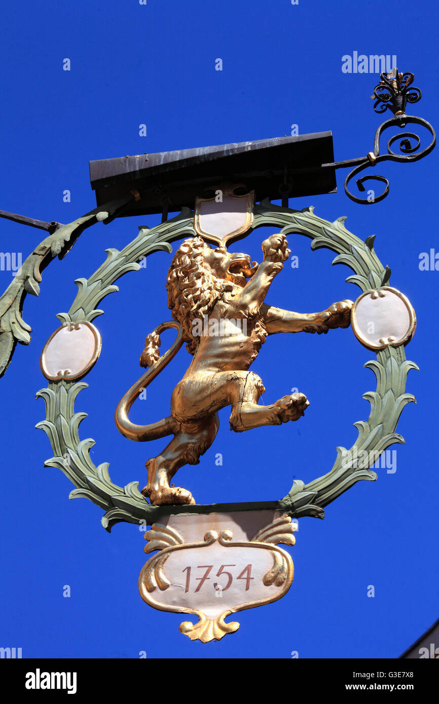 Austria, Tyrol, Innsbruck, shop sign, golden lion, Stock Photo