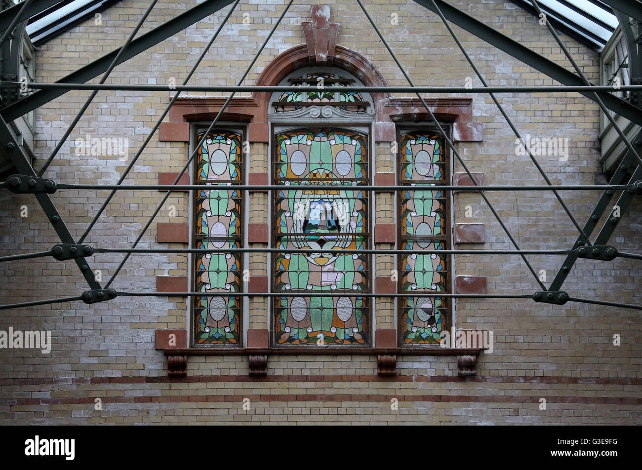 Stained glass window and restored roof at Victoria Baths in Manchester