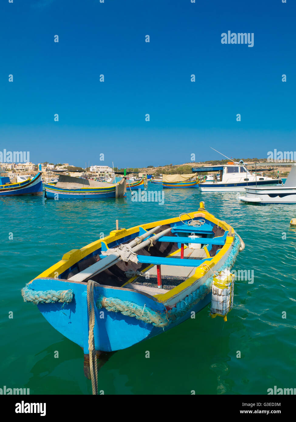 brightly coloured maltese rowing boat Stock Photo