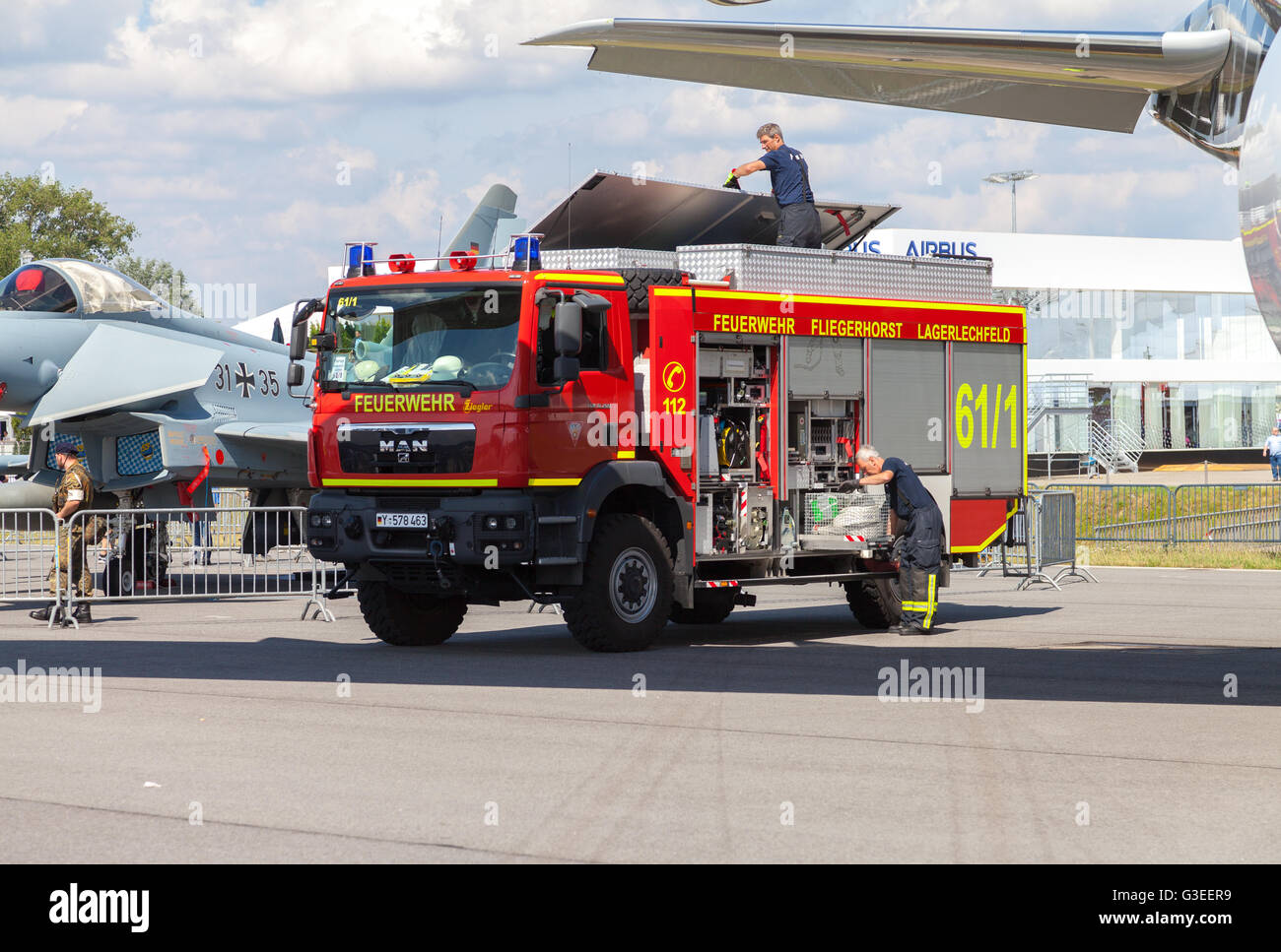 BERLIN / GERMANY - JUNE 4, 2016: german fire service truck stands on airport in schoenefeld, berlin / germany at june 3, 2016. Stock Photo