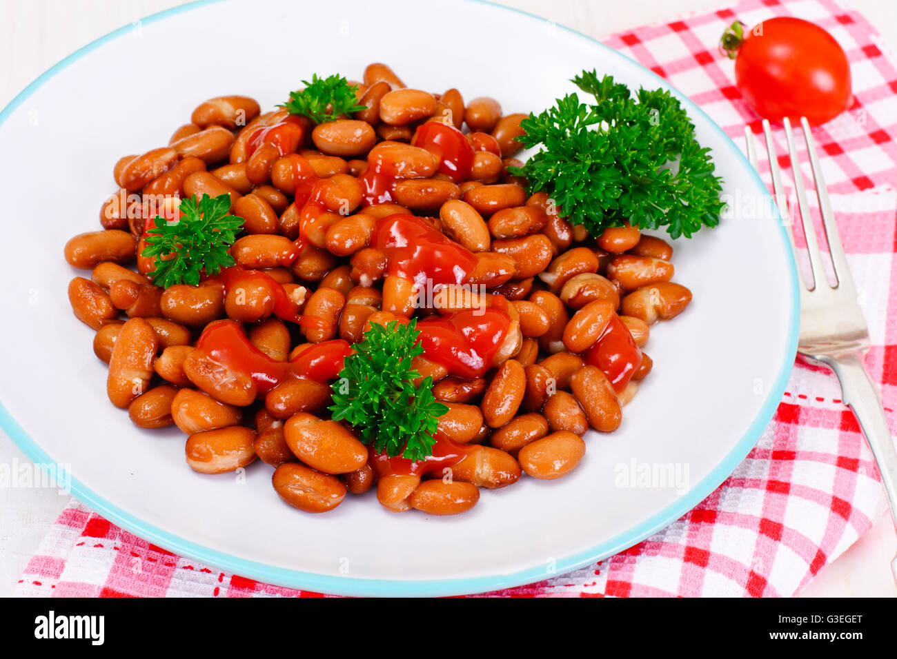 Baked Beans with Tomato Paste and Parsley Stock Photo Alamy