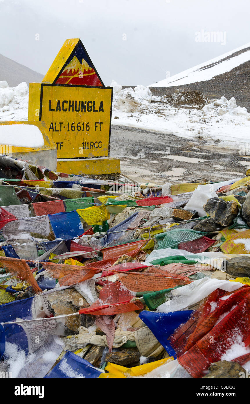 Prayer, flags, beside dirt road over mountain pass, Lachungla pass, Manali - Leh Road, Himachal Pradesh, India, Stock Photo
