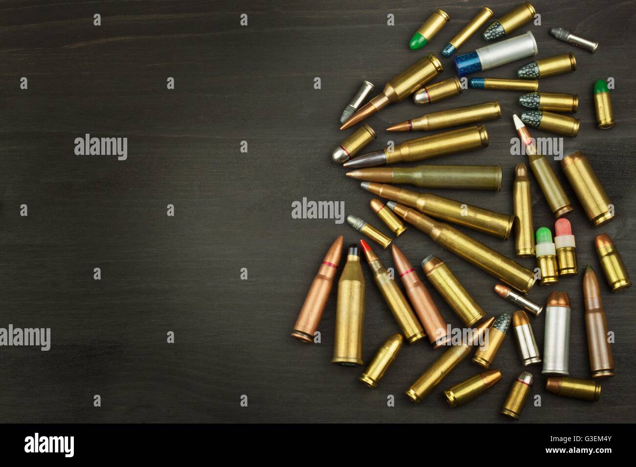 New types of ammunition. Bullets of different calibers and types. The right to own a gun. Sales of weapons and ammunition. Stock Photo