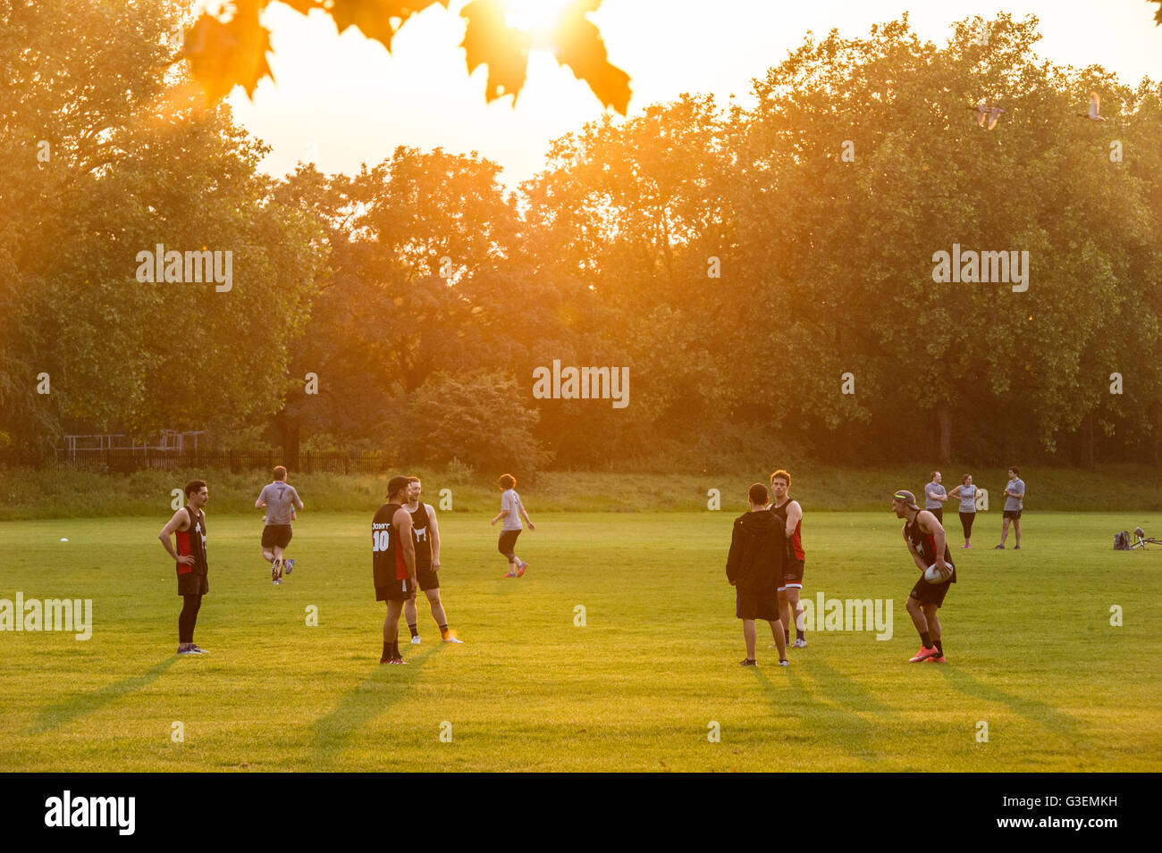 Playing Rugby Outside Rugby training in the evening sun in a London park Stock Photo - Alamy
