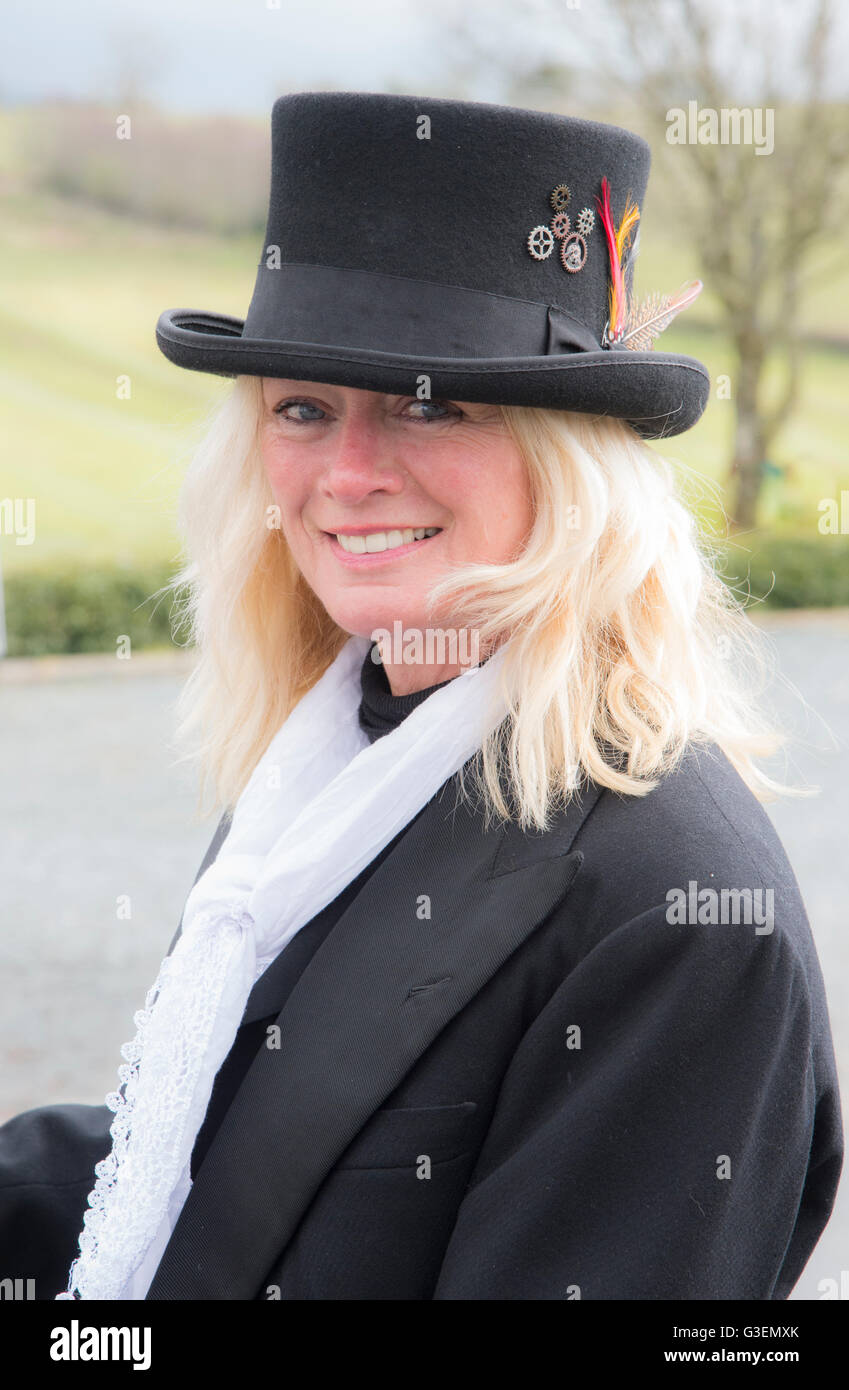 Young woman in stylish black Top Hat Stock Photo