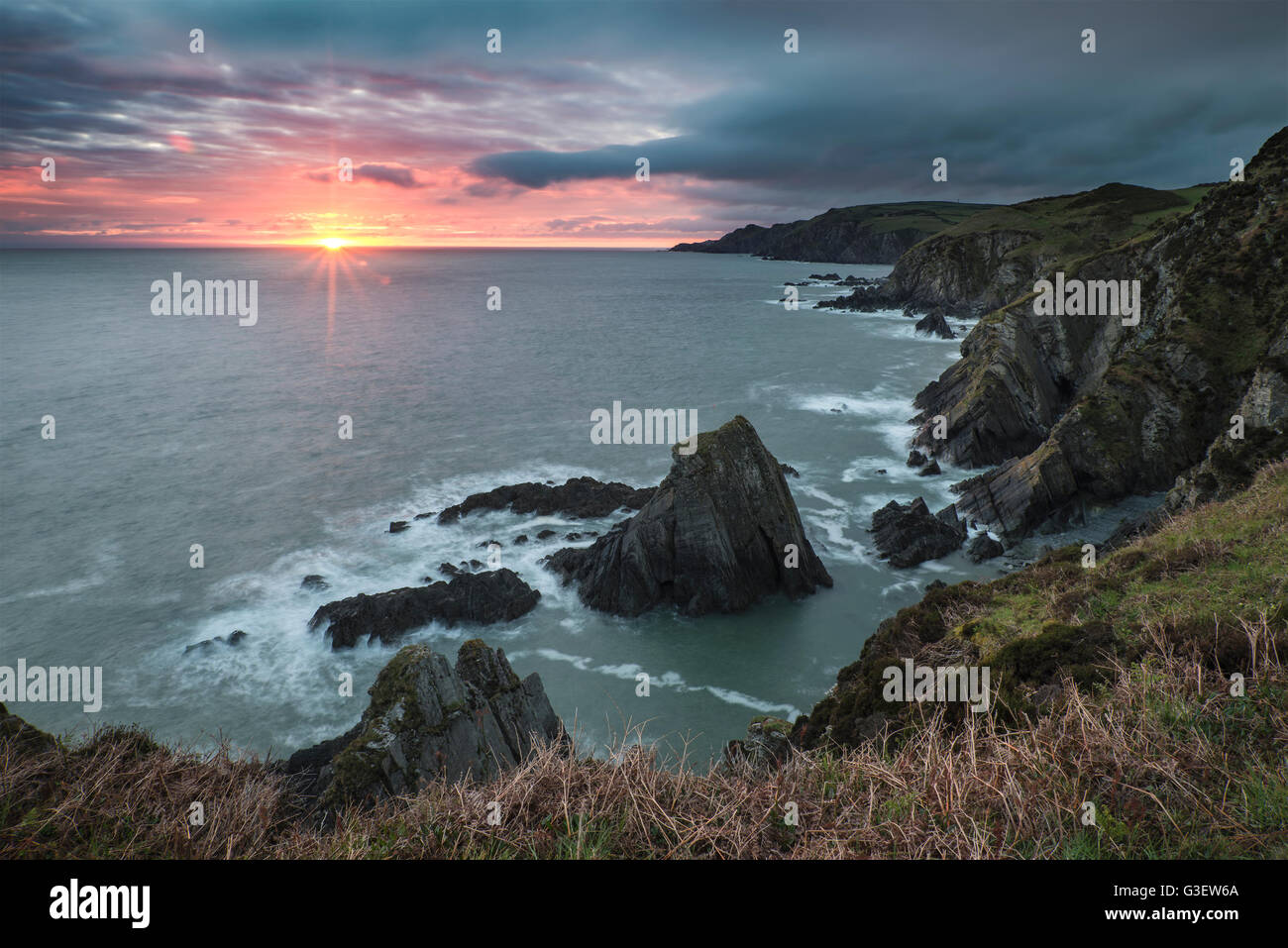 Dramatic sunrise landscape over Bull Point in Devon England Stock Photo ...