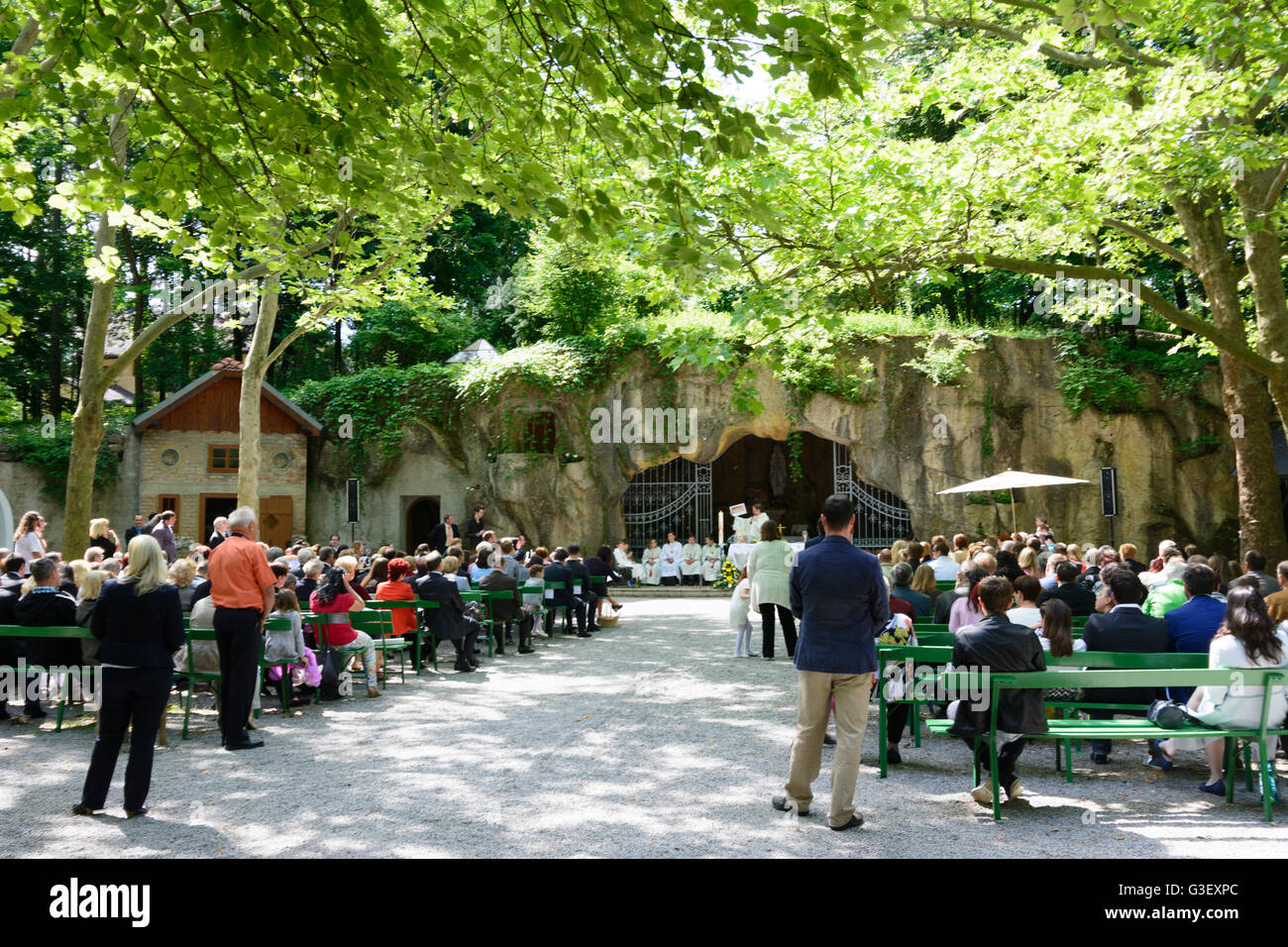 Lourdes Grotto in Maria Ellend at a first communion, Austria, Niederösterreich, Lower Austria, Donau, Haslau-Maria Ellend Stock Photo