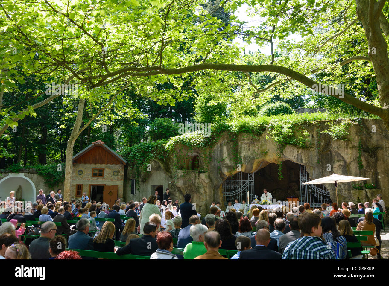 Lourdes Grotto in Maria Ellend at a first communion, Austria, Niederösterreich, Lower Austria, Donau, Haslau-Maria Ellend Stock Photo