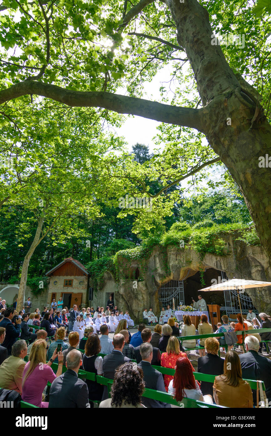 Lourdes Grotto in Maria Ellend at a first communion, Austria, Niederösterreich, Lower Austria, Donau, Haslau-Maria Ellend Stock Photo