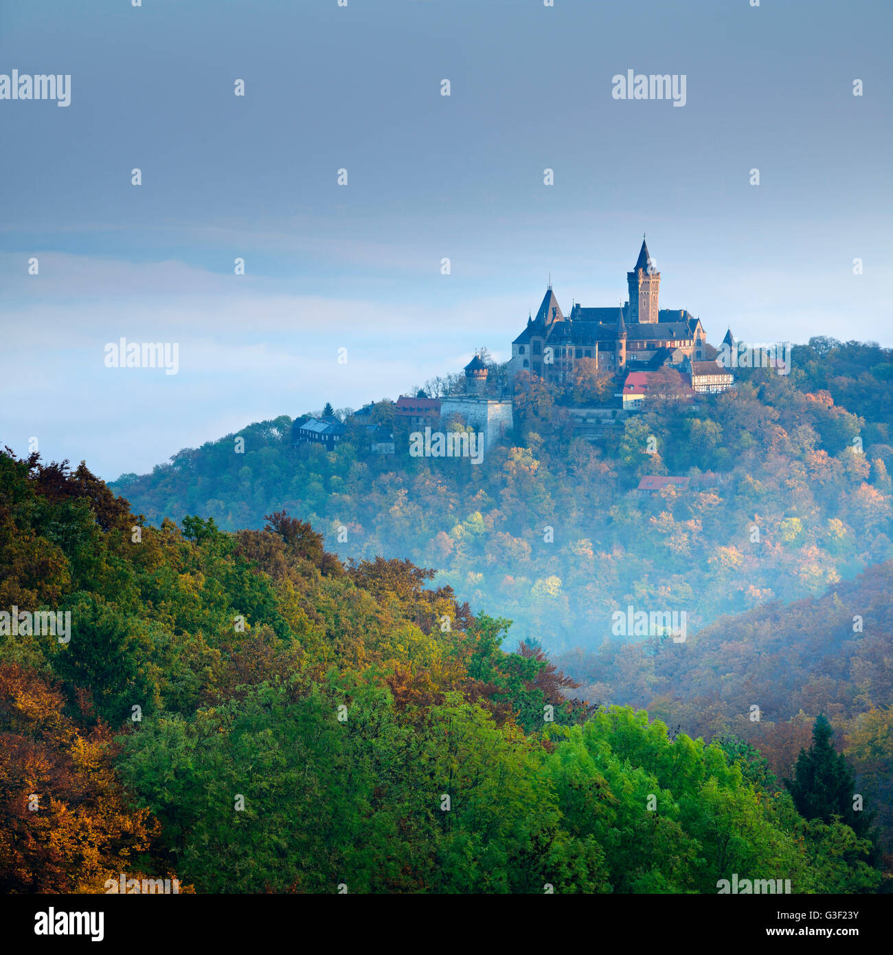 Lock Wernigerode in the first morning light, behind morning fog, Wernigerode, Saxony-Anhalt, Germany Stock Photo