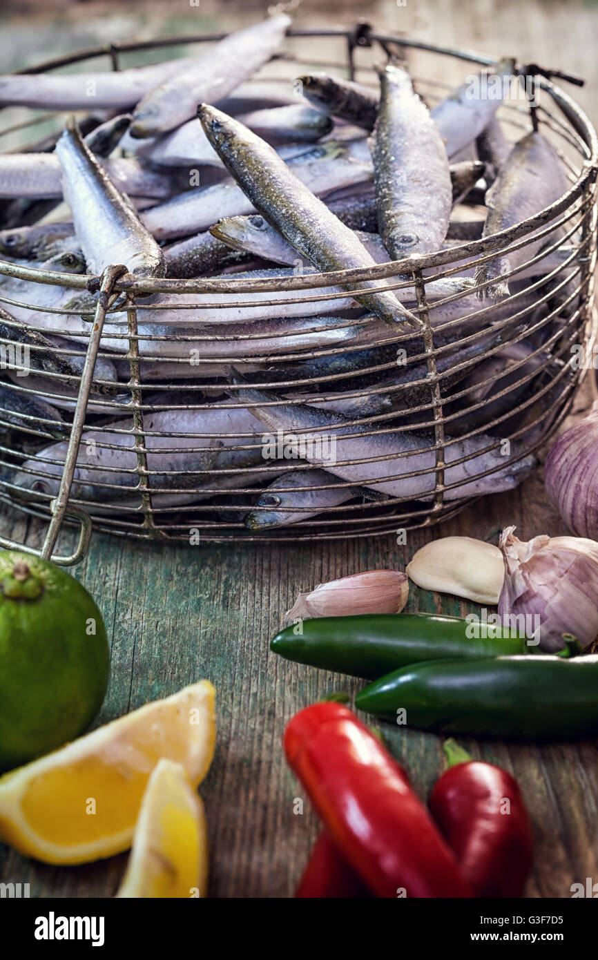 raw sardines with garlic, lemon and Jalapeño peppers Stock Photo Alamy
