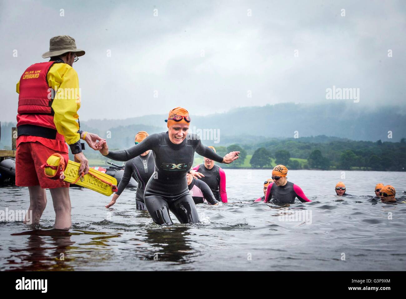 Swimmers take part in the Great North Swim on Lake Windermere in Cumbria. Stock Photo