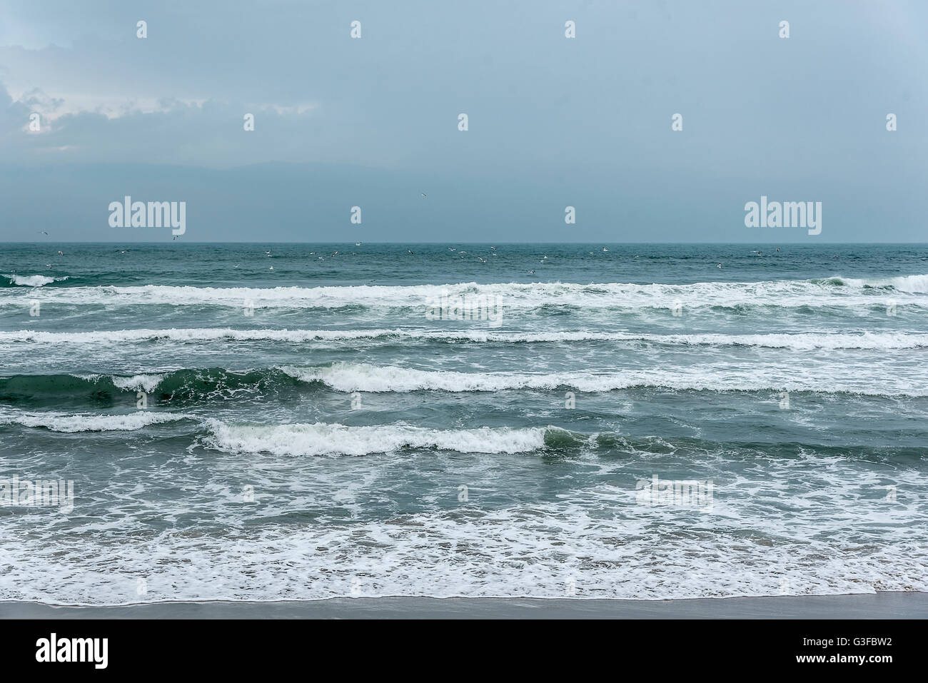 Dark stormy sky and stormy sea waves Stock Photo - Alamy