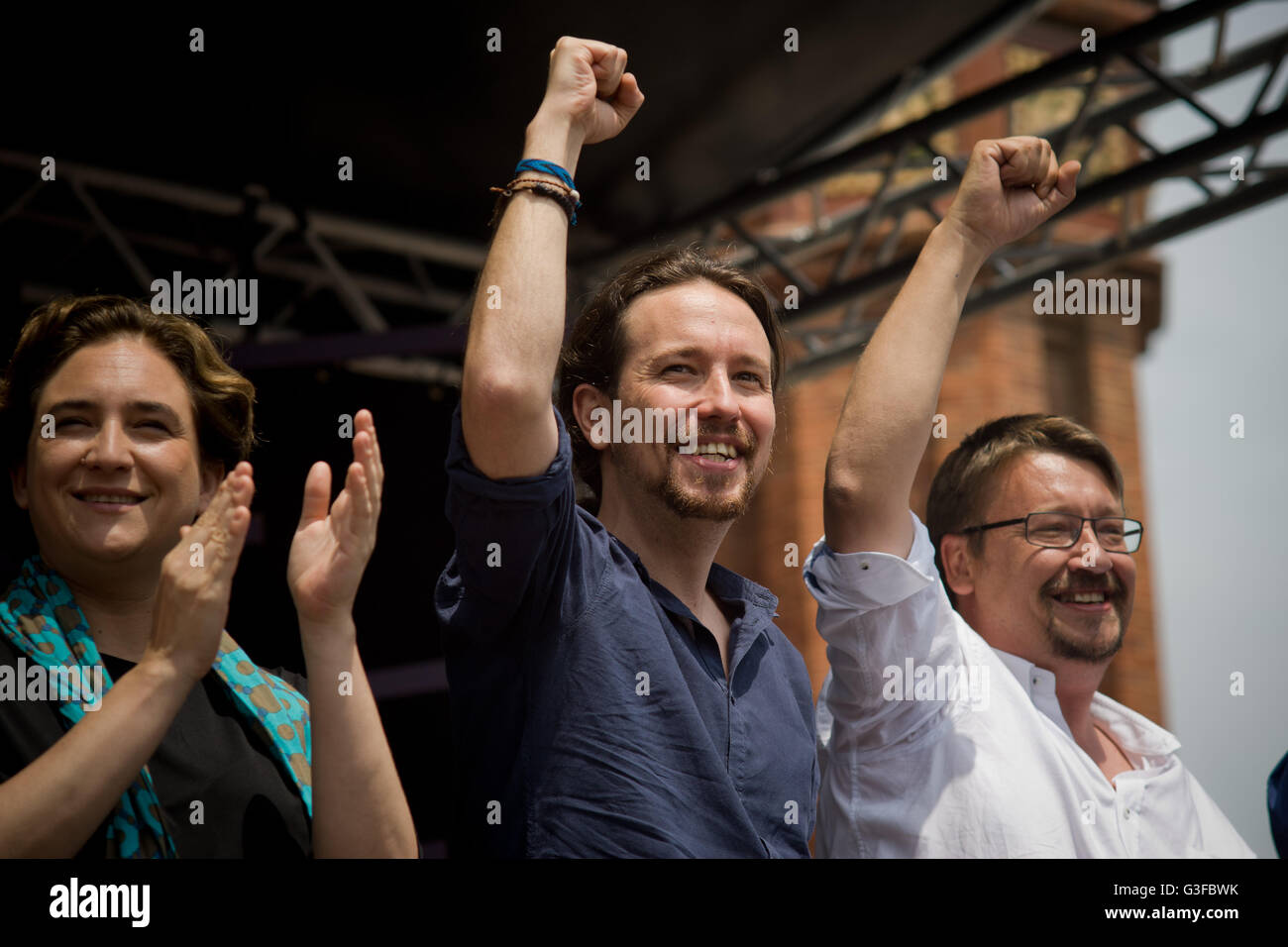 Ada Colau, Pablo Iglesias and Xavier Domenech during a politcal rally in Barcelona. Stock Photo