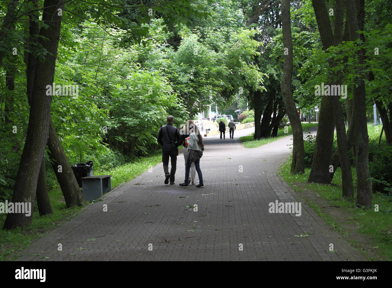 Gdansk, Poland 11th, June 2016 Sunny but cold Saturday in Gdansk, After few weeks of very warm weather, today temperature dropped to 14 Celsius degrees. Cooling sensation is intensified by a strong northern wind. People walking in park near the Brzezno beach are seen. Credit:  Michal Fludra/Alamy Live News Stock Photo