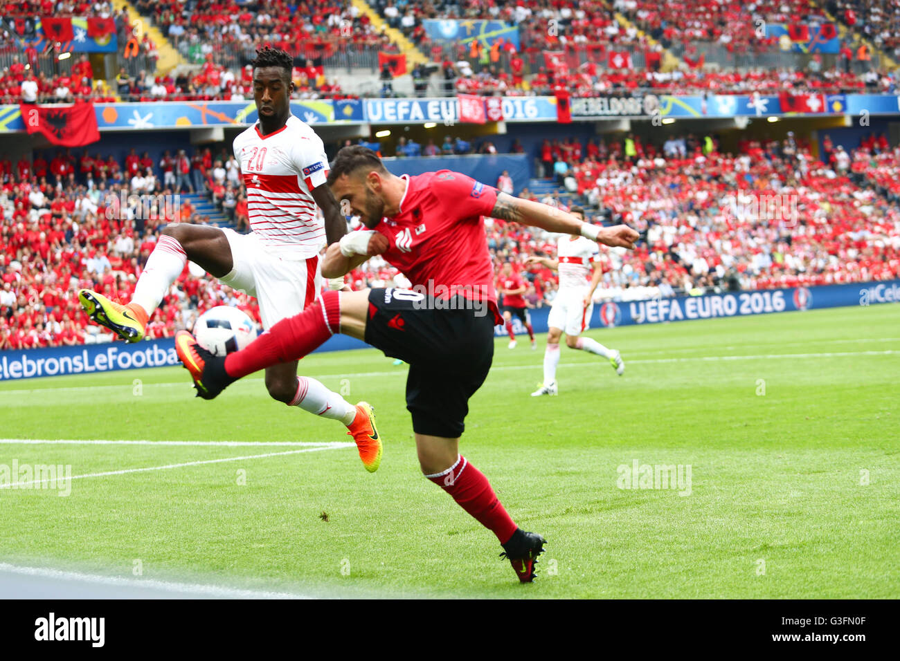 Stadium Felix Bollaert, Lens, France. 11th June, 2016. European football tournament 2016. Albania versus Switzerland. Johan Djourou ( Suisse )closes down the hot from Armando Sadiku ( alb ) Credit:  Action Plus Sports/Alamy Live News Stock Photo