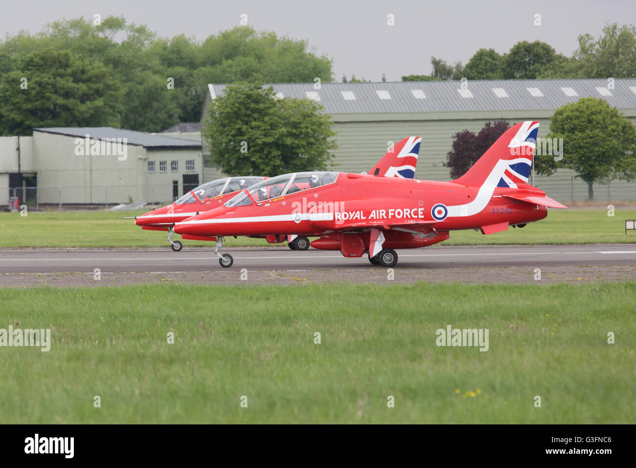 Biggin Hill, UK. 11th June 2016. Royal Air Force red arrows on the runway at Biggin Hill Festival of Fligh Credit: Keith Larby/Alamy Live News Stock Photo
