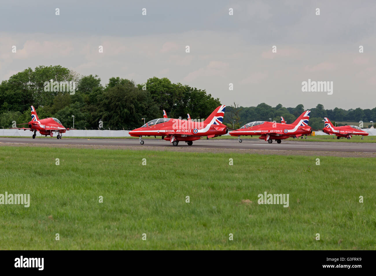 Biggin Hill, UK. 11th June 2016. Royal Air Force red arrows on the runway at Biggin Hill Festival of Fligh Credit: Keith Larby/Alamy Live News Stock Photo